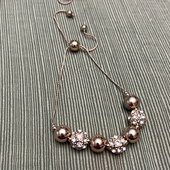 Used 4 slide adjust bracelets, alternating metallic and rhinestone beads - Picture 2 of 5